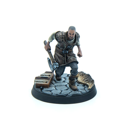 Miniature of a determined man in leather, striding with a raised pickaxe on a cobblestone base