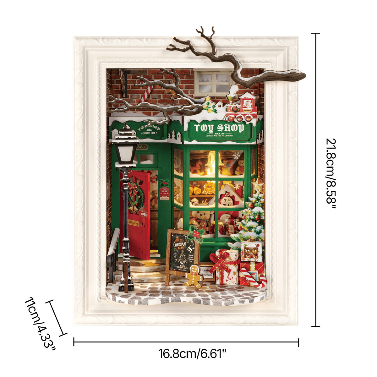 Detailed miniature 3D Christmas Toy Shop scene housed in a white decorative frame