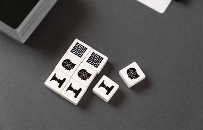 White and black strategy game tiles featuring brain maze and puzzle head icons