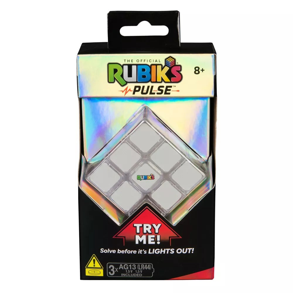 Rubik's Pulse electronic light-up cube in black and holographic packaging, with a white cube face visible and 'TRY ME!' text