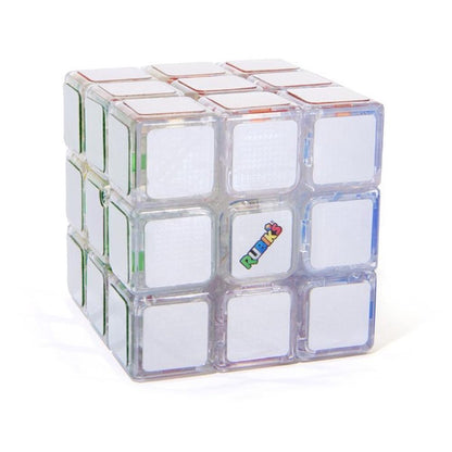 Transparent Rubik's Cube with white squares, revealing a colourful internal mechanism, the Rubik's logo is visible on one face