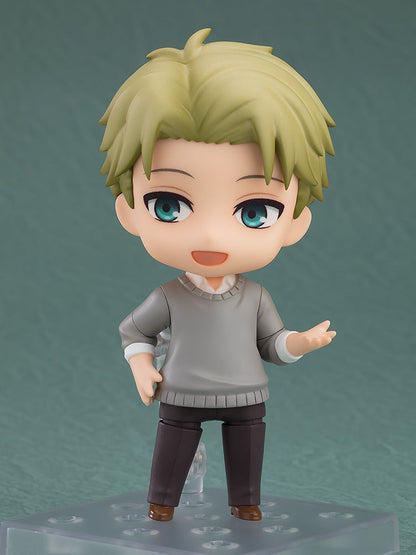 Nendoroid figure of Loid Forger with blonde hair, blue eyes, smiling in a grey sweater, gesturing