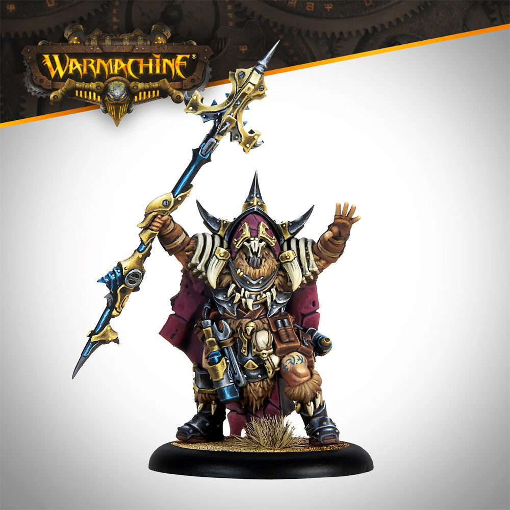 Warmachine Trollkin miniature in a red cape and armor, holding an ornate gold-blue staff, with one hand raised