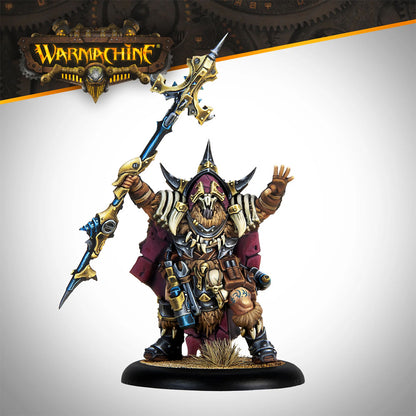 Warmachine Trollkin miniature in a red cape and armor, holding an ornate gold-blue staff, with one hand raised