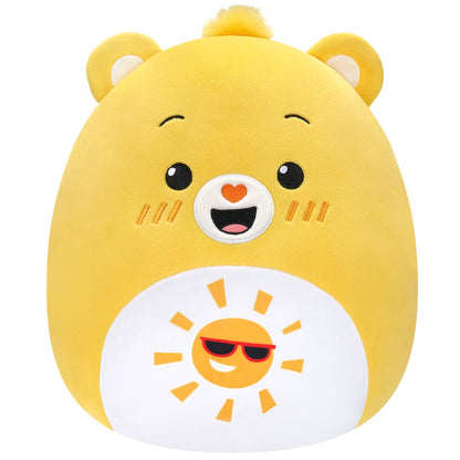 Yellow 10-inch Squishmallow Funshine Bear plush with a smiling face, fuzzy head tuft, and a cool sun wearing sunglasses on its white belly