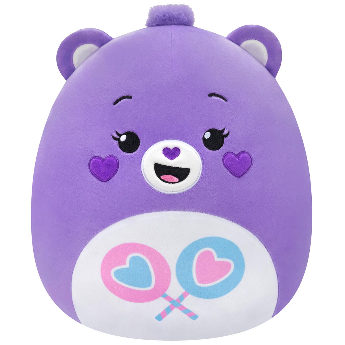 Plush 10-inch purple Care Bear Squishmallow with a cheerful embroidered face and a white belly badge showing pink and blue heart lollipops