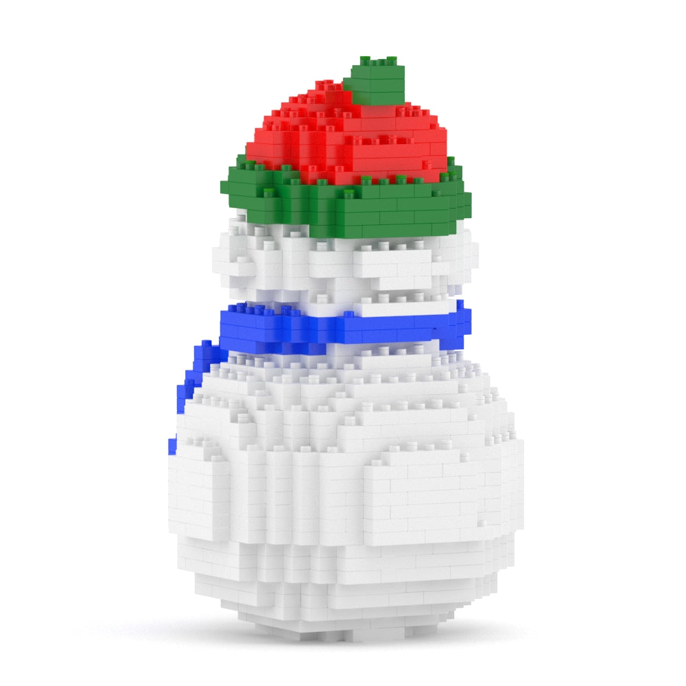 White construction brick snowman with a red and green hat and a blue scarf