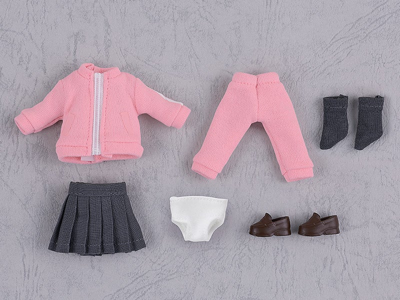 Set of doll clothes including a pink zip-up jacket pink sweatpants gray pleated skirt white underwear and brown loafer shoes