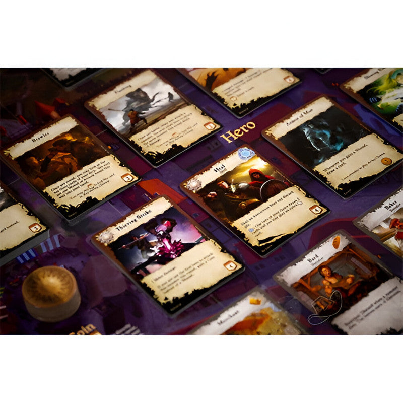 A fantasy board game setup with various character cards on a dark purple mat, including a &quot;Hero&quot; section