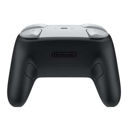 Black and white Nintendo Switch 2 Pro Controller, back view. Shows ZR, ZL, GR, and GL buttons