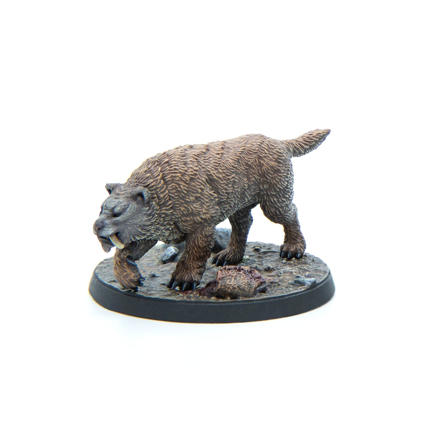 Miniature brown saber-toothed cat with prominent fangs, feeding on a kill on a rocky base