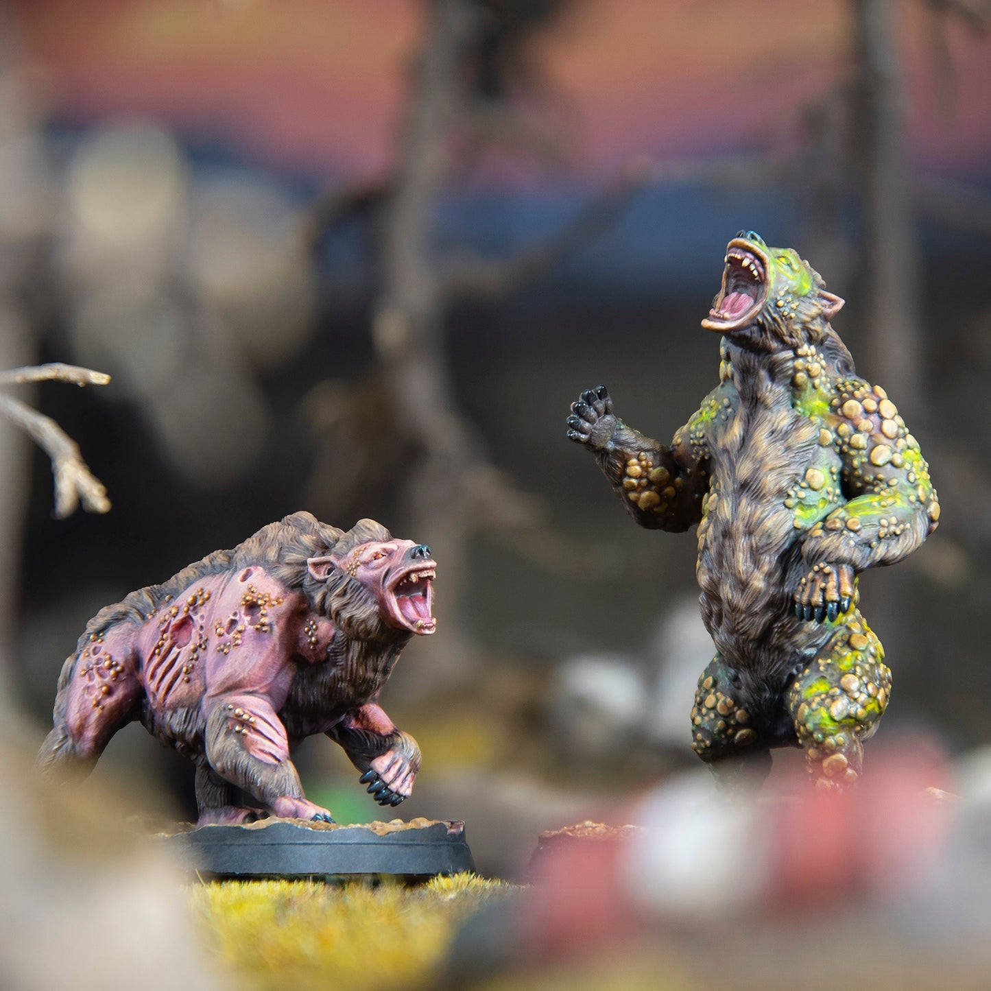 A purple quadruped snarls at a green biped roaring with raised paws