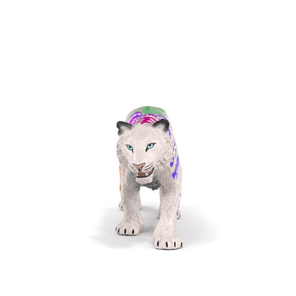 A white tiger with bright blue eyes and colorful paint splatters, standing and facing forward