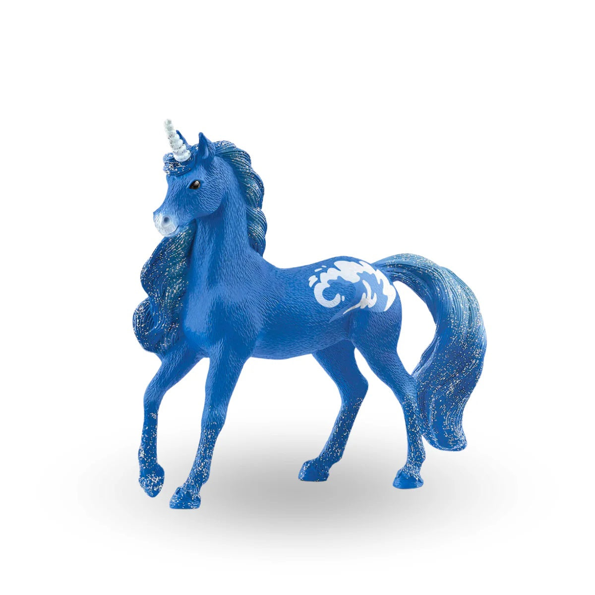 A blue unicorn figure with white horn, glittery mane, tail, hooves and white cloud patterns on its flank
