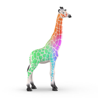 A standing giraffe with vibrant, rainbow-colored patches on white fur. Colors gradient from orange head to green body