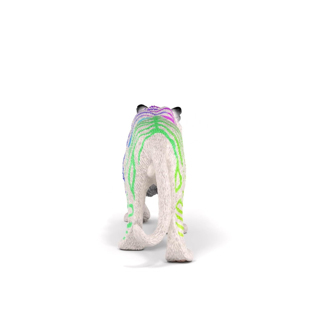 Rear view of a white tiger figure with vibrant green and purple stripes, standing on white