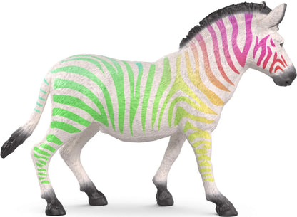 A white zebra figurine with green-to-red rainbow stripes stands on a white background