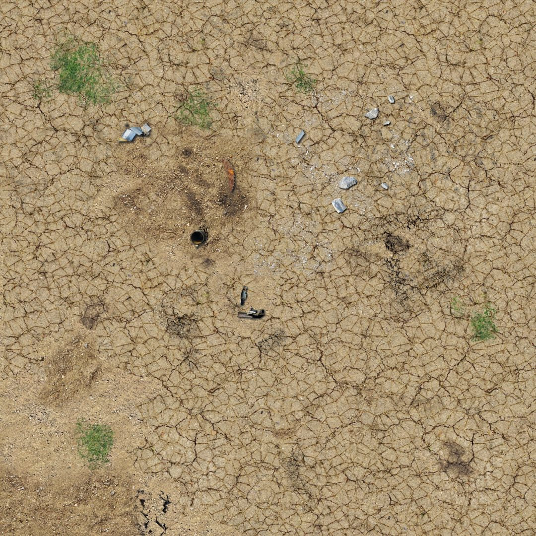 Aerial view of dry, cracked earth with a dark pipe, scattered debris, and sparse green grass patches.