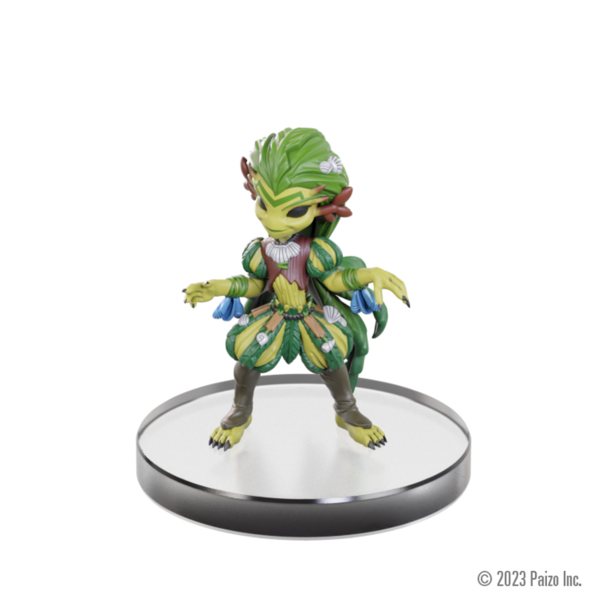 A green-skinned humanoid plant creature miniature in an elaborate green and yellow costume, standing poised on a clear base