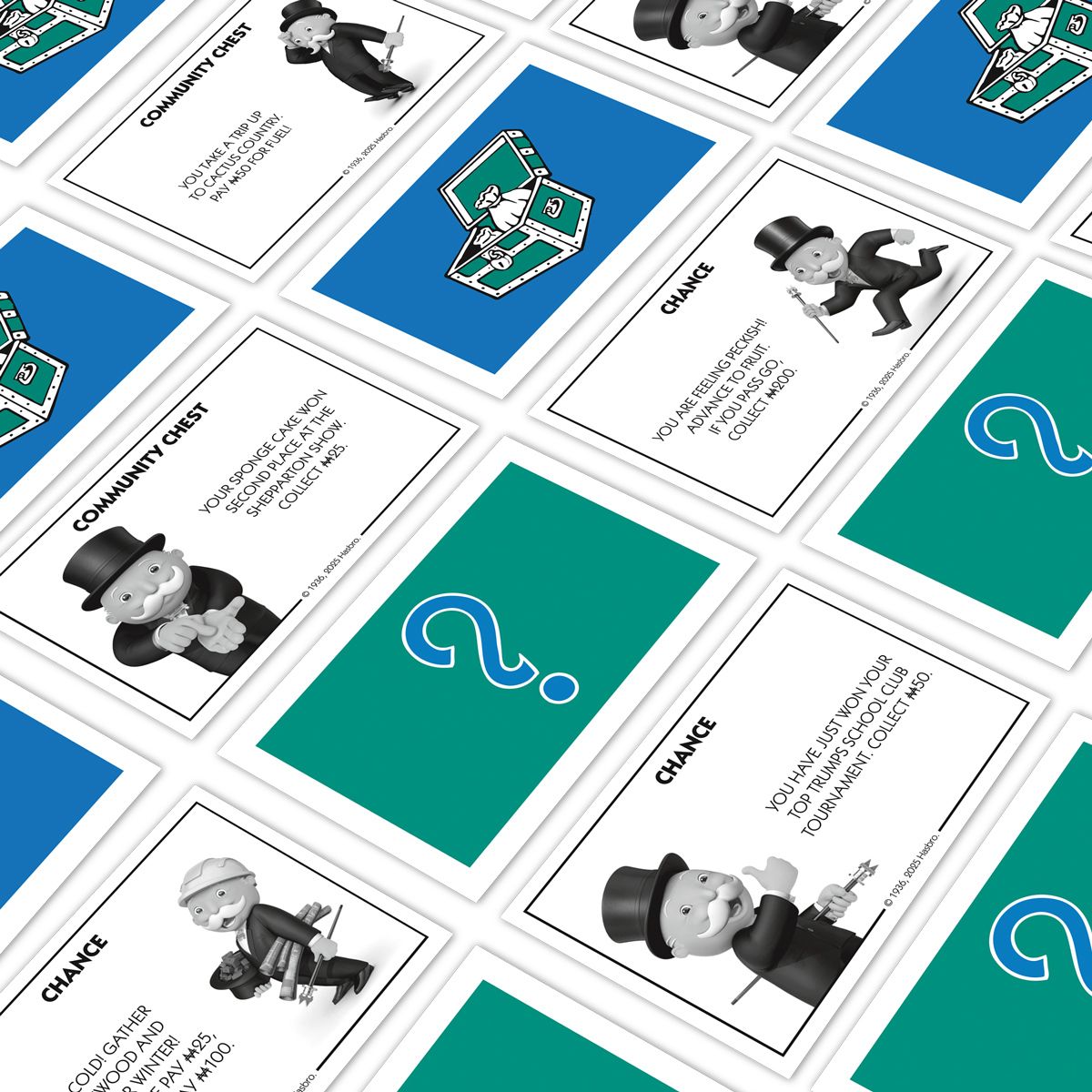 Monopoly game cards: Community Chest and Chance cards featuring Rich Uncle Pennybags are spread out