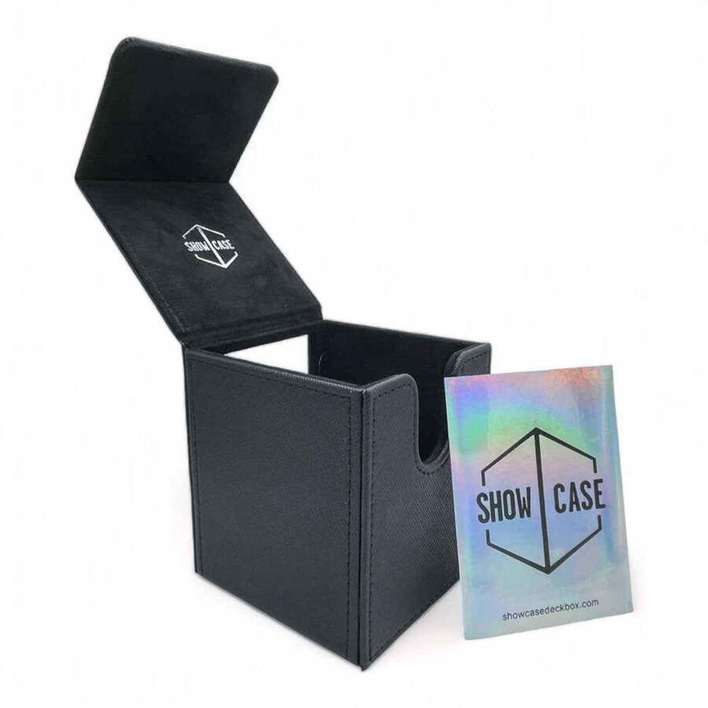 Black textured 'SHOW CASE' deck box with an open lid, revealing the logo inside, and a holographic product card next to it