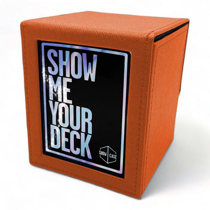 Orange textured trading card deck box with holographic 'SHOW ME YOUR DECK' text on a front label and 'SHOW CASE' logo