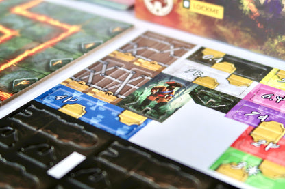 Detailed view of game components from 'Side Quest: 7th Sea', including puzzle-like map pieces and items