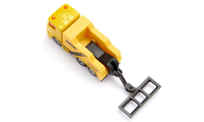Yellow ADAC toy tow truck with a rear recovery arm