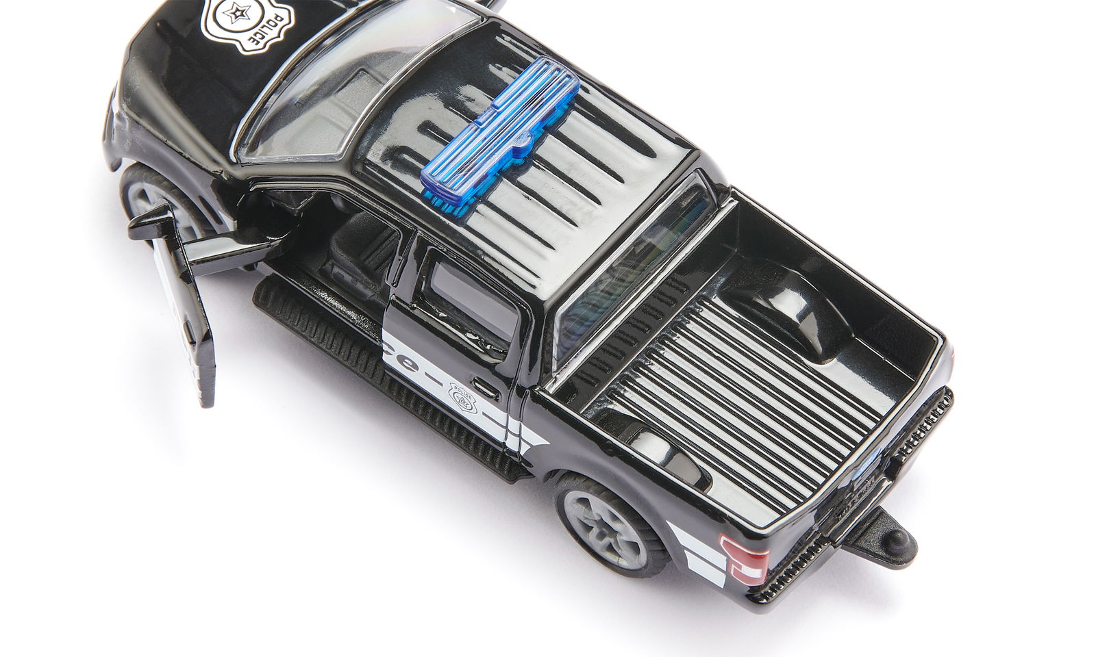 Black toy Siku Ford F-150 US police truck model with blue light bar and open driver's door