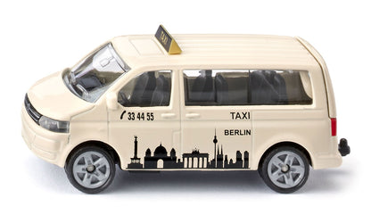 Beige die-cast Siku VW T5 Berlin taxi van model, featuring a black skyline decal and roof sign