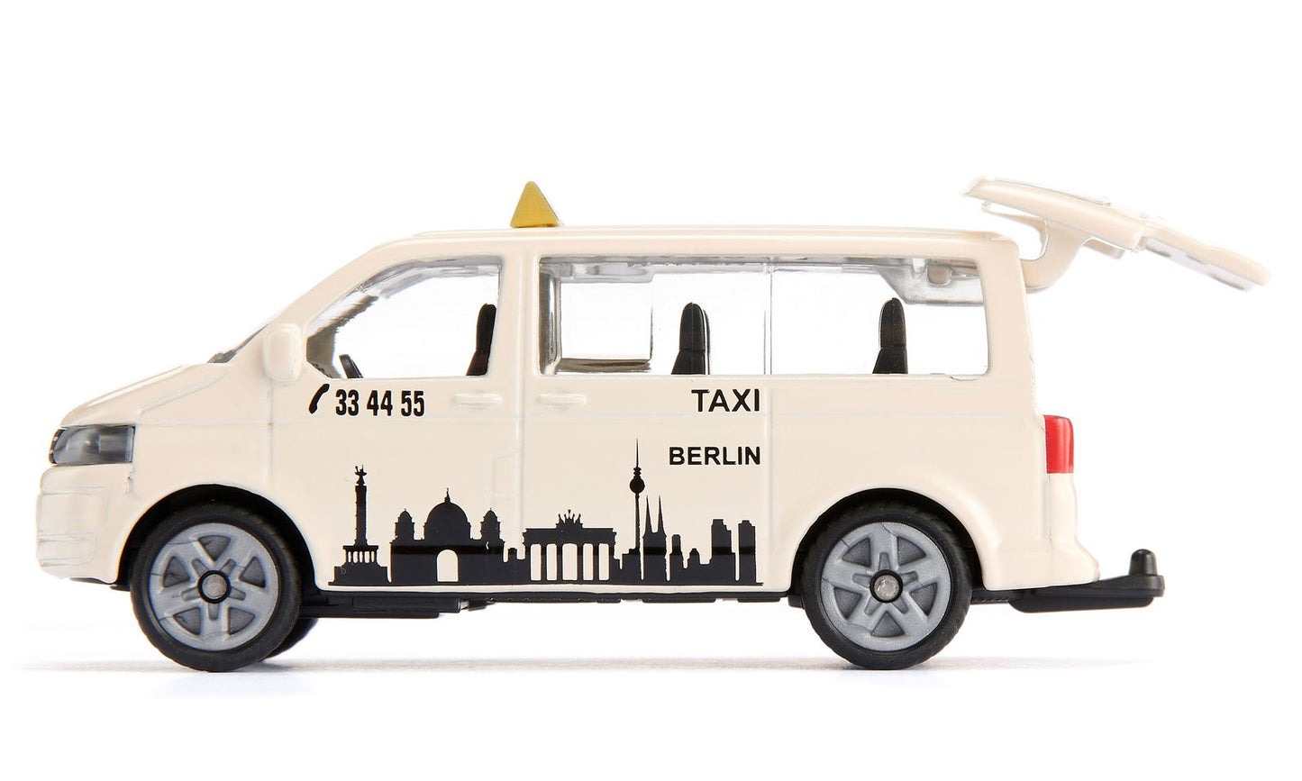 Die-cast beige Siku VW T5 Berlin taxi van model with skyline decals and open rear hatch