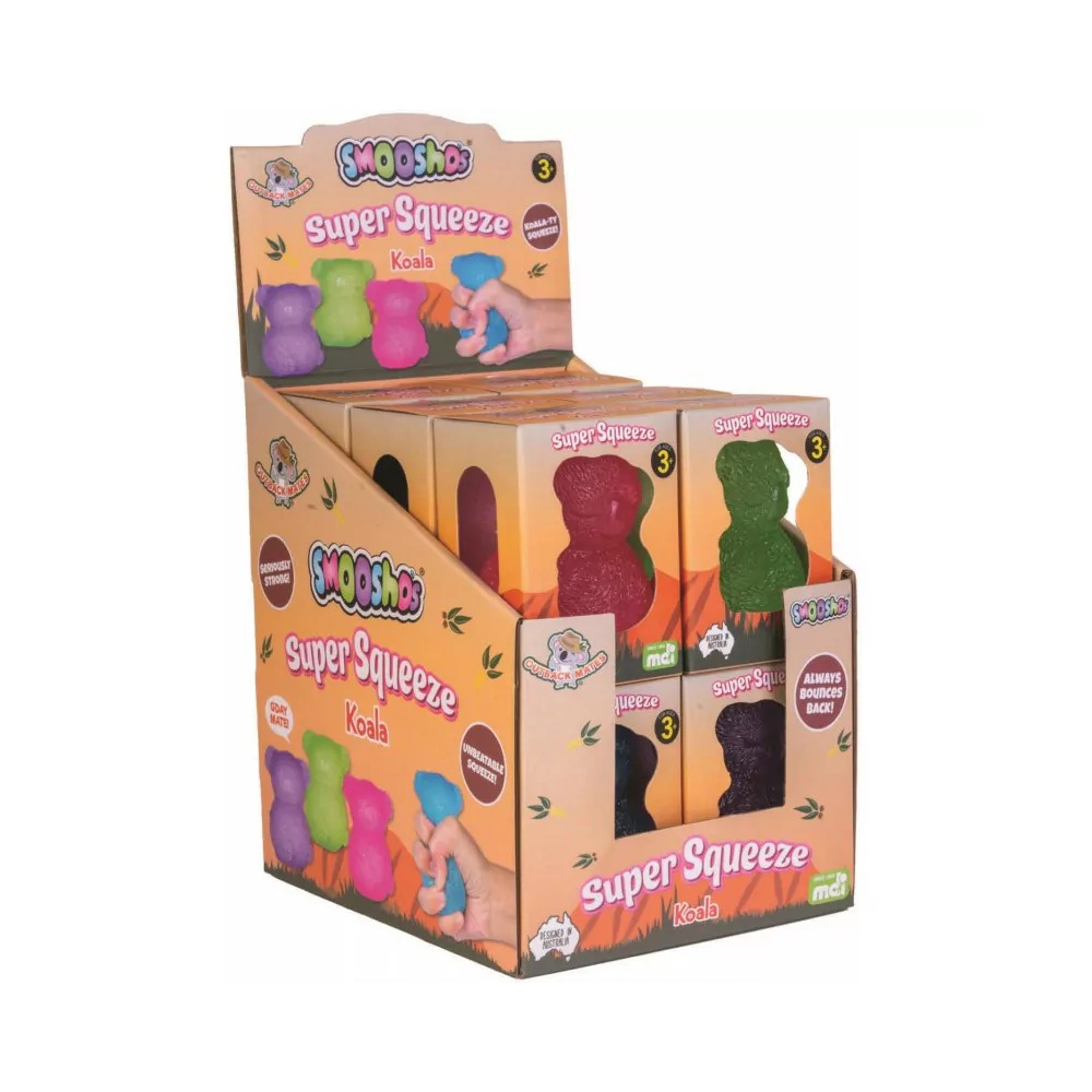 Display box of colorful Smooshos Super Squeeze Koala toys; a hand squeezes a blue koala