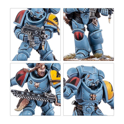Close-up views of painted Warhammer 40K Space Wolves miniatures in blue armor with bolter and chainsword