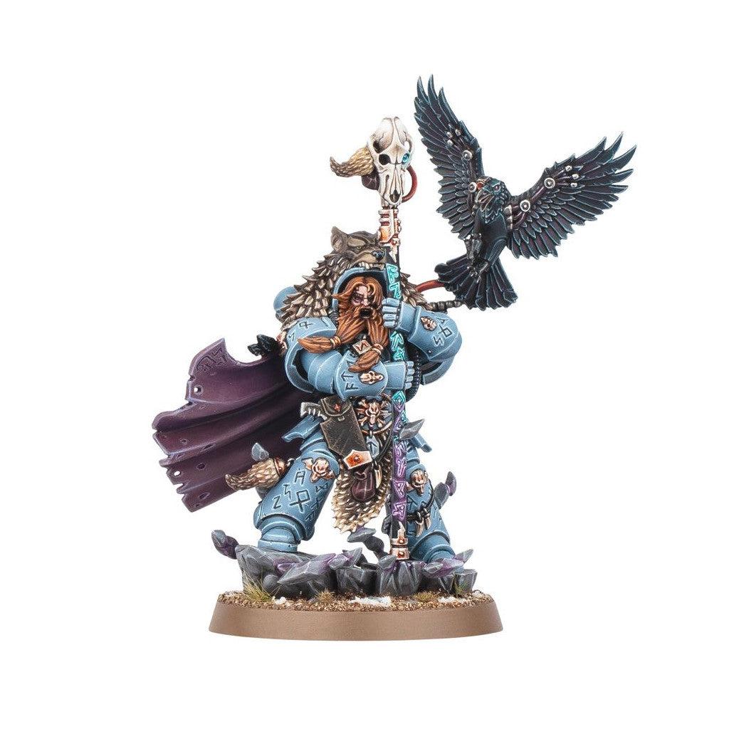 Bearded Space Wolf warrior miniature in blue armor, wolf pelt, holding a skull staff, with a raven flying alongside