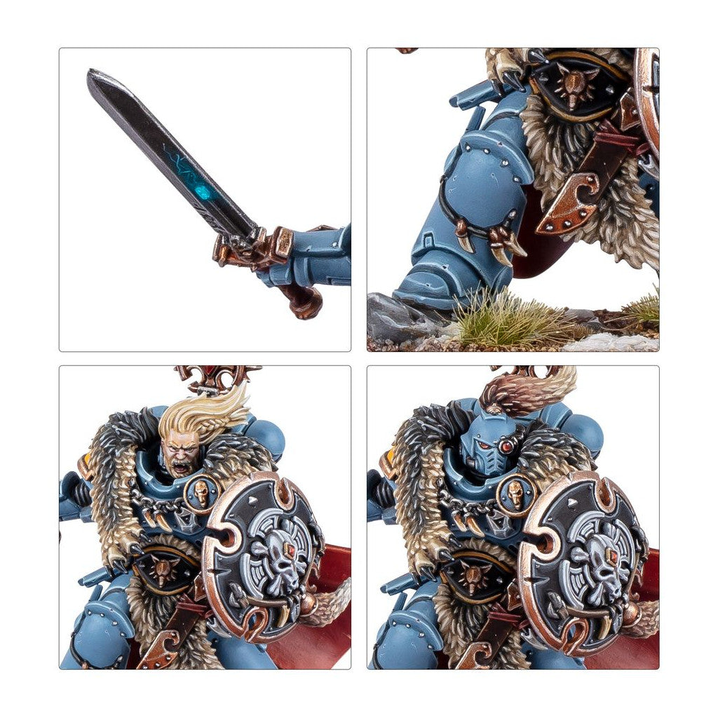 Detailed blue-armored Space Marine miniature with fur, glowing sword, and wolf shield