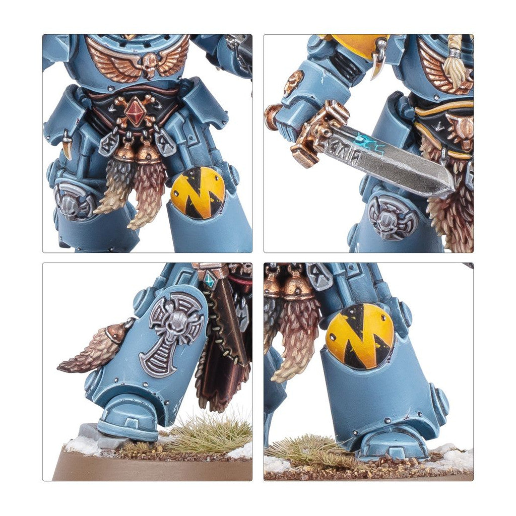 Close-ups of a highly detailed Warhammer 40K Space Wolf miniature with blue armor, fur pelts, a sword, and Nordic symbols