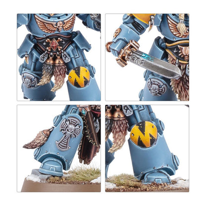 Close-ups of a highly detailed Warhammer 40K Space Wolf miniature with blue armor, fur pelts, a sword, and Nordic symbols