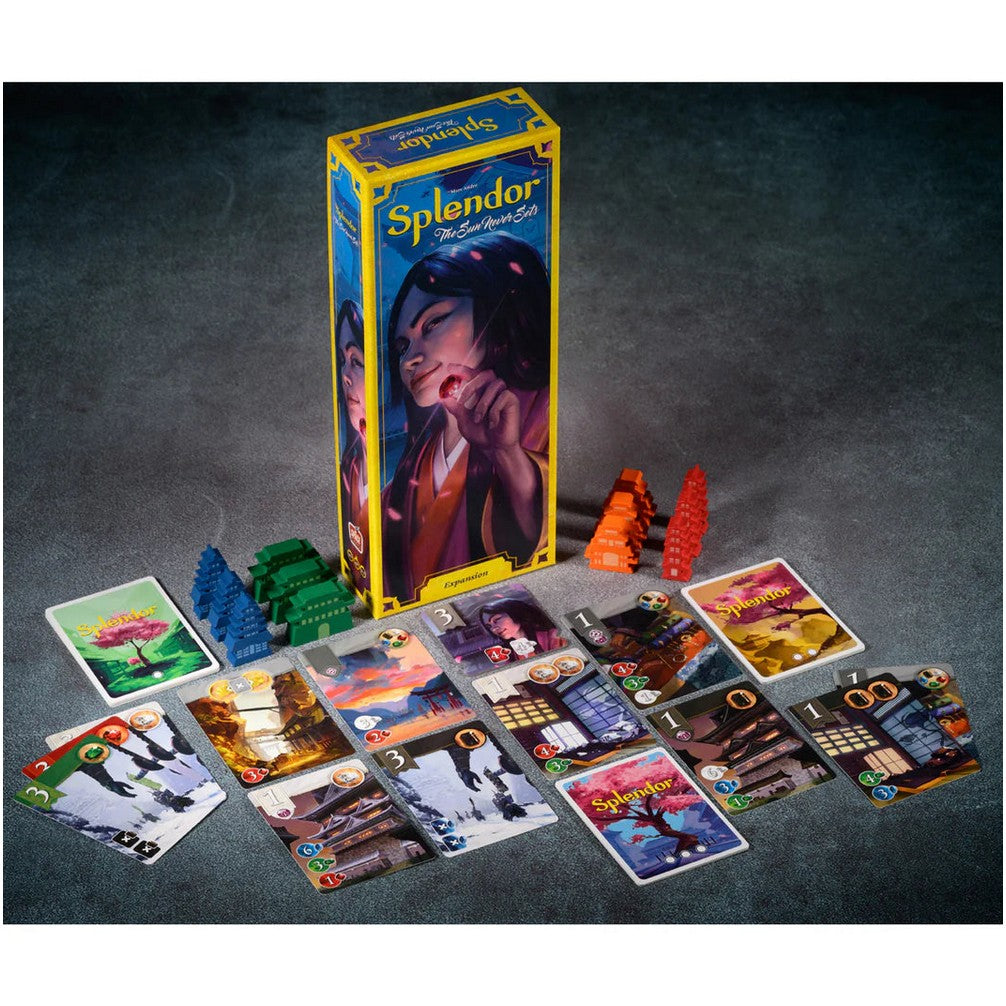 The Splendor The Sun Never Sets board game box and its components are laid out on a dark surface. colourful cards and pagoda tokens are visible