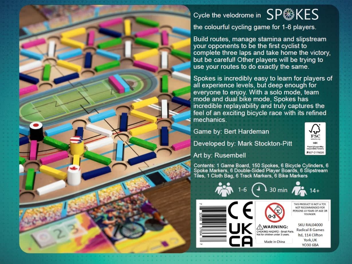 The "Spokes" board game, showing colorful pieces forming routes on a velodrome track with bicycle markers