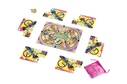 A vibrant bicycle racing board game with an oval track, colorful pieces, illustrated bicycle cards, and a pink bag