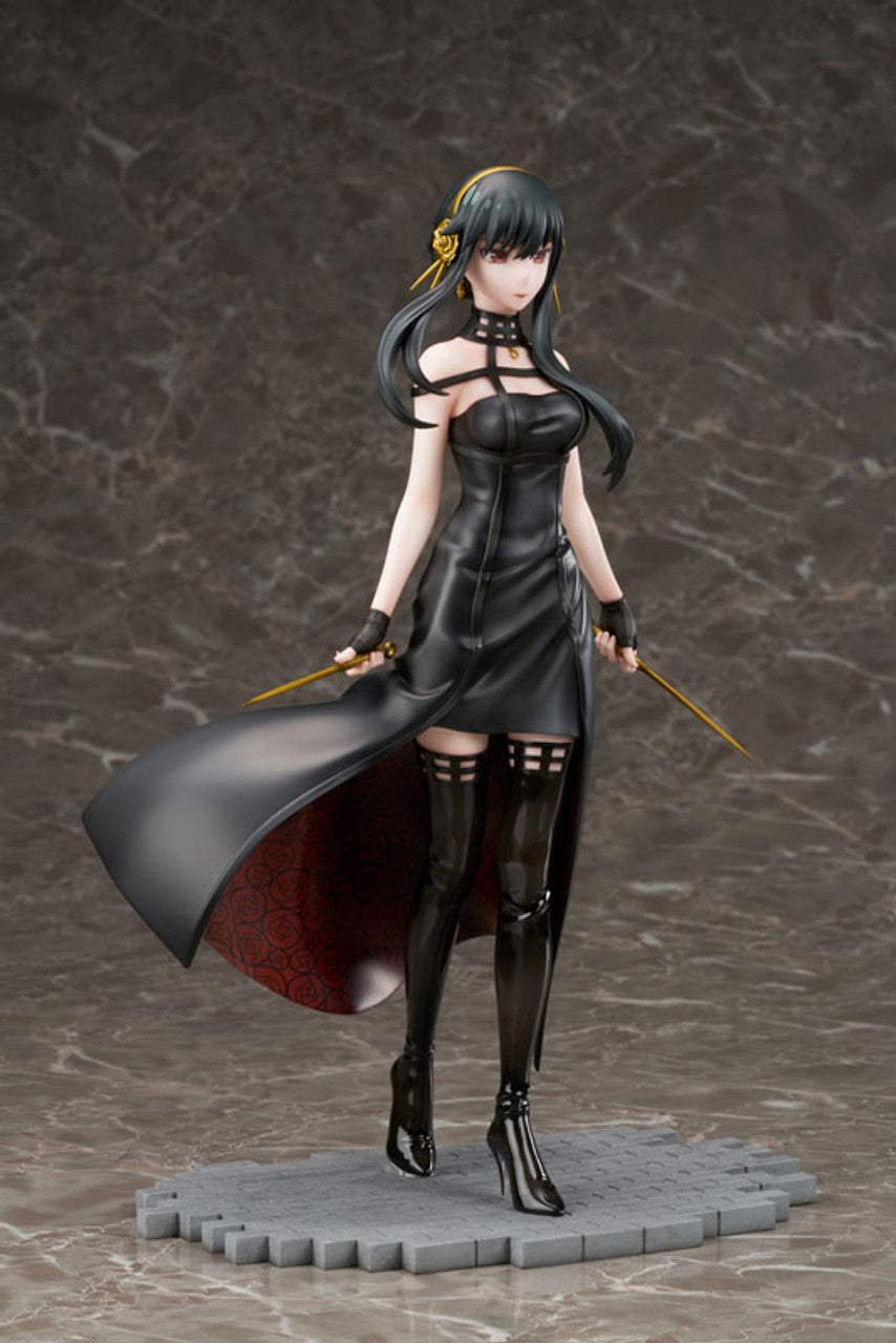 A full-body Yor Forger figure with black hair, wearing a black high-slit dress with a red patterned lining, black thigh-high boots, holding two golden stiletto weapons