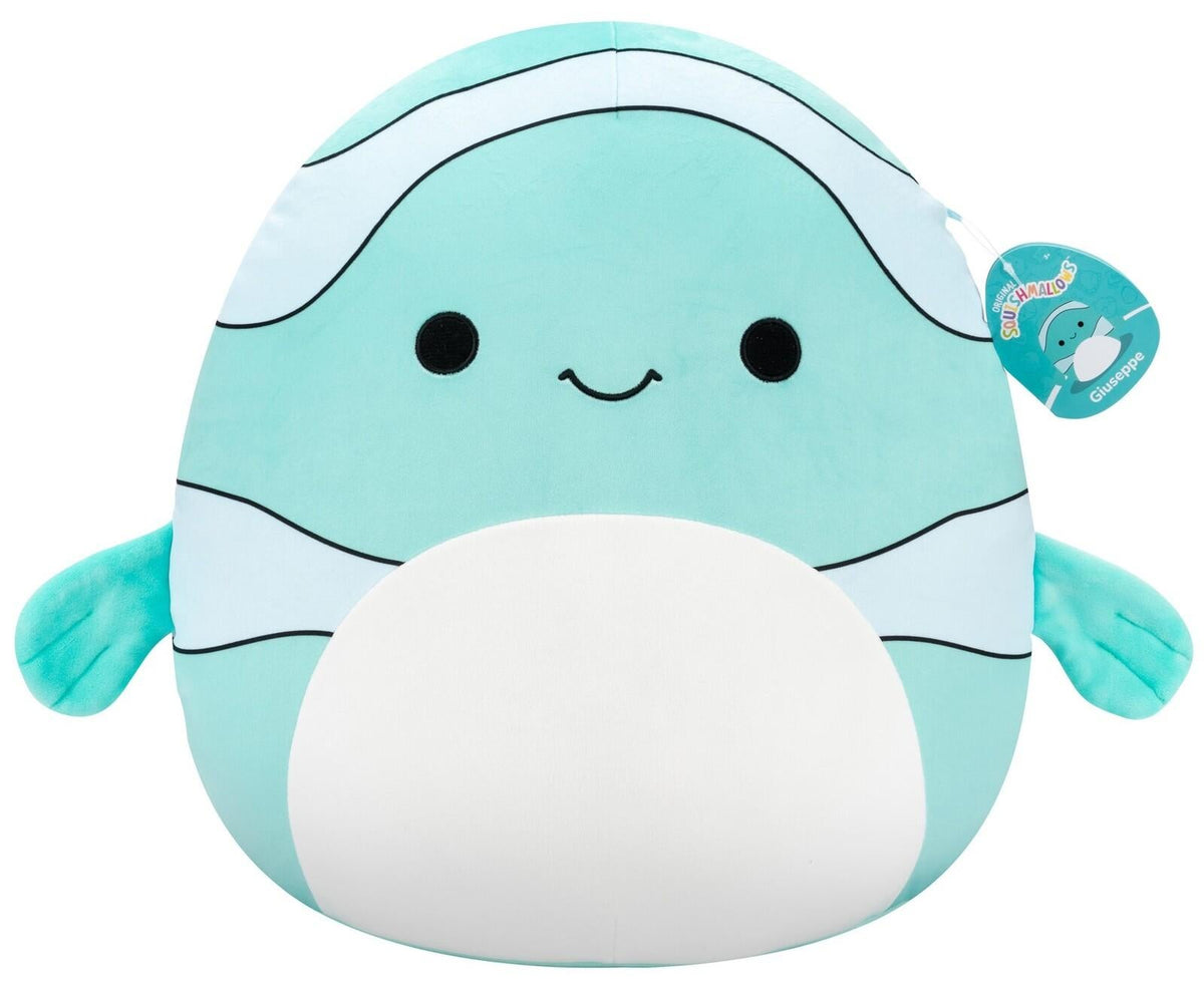 Teal and white Giuseppe Squishmallow plush, an oval marine creature with embroidered eyes and a smiling mouth, shown with its tag