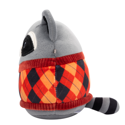 Grey plush toy in side profile, wearing an argyle sweater with red, orange, and dark blue diamonds