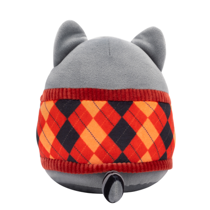 Grey plush toy back view, wearing an argyle sweater with red, orange, and dark blue diamonds