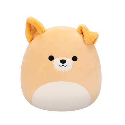Peach-colored Squishmallow Shiba Inu plush toy with black eyes, white muzzle, embroidered smile, and fuzzy orange ears