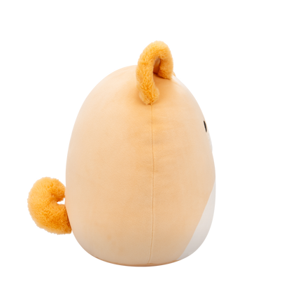Side view of peach-colored Squishmallow Shiba Inu plush toy with black eyes, white muzzle, embroidered smile, and fuzzy orange ears