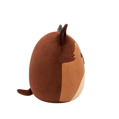 Side view of brown and tan Squishmallow plush toy with dark brown pointed ears, black eyes, and a small black nose