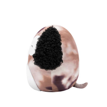 Side view of round plush dog toy with speckled brown body, curly black ears, white belly, and a winking, smiling face