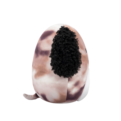 Side view of round plush dog toy with speckled brown body, curly black ears, white belly, and a winking, smiling face
