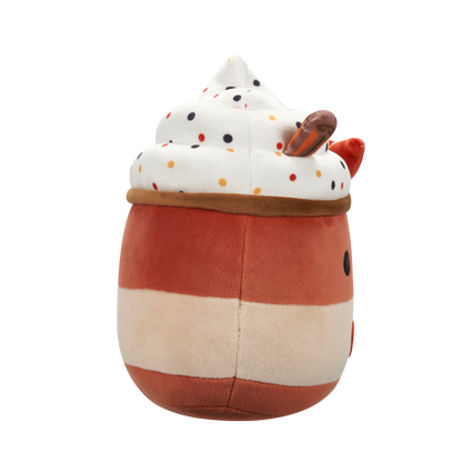 Side view of apple pie plush toy with whipped cream, colorful sprinkles, a smiling face, an apple slice, and an embroidered apple on its striped body